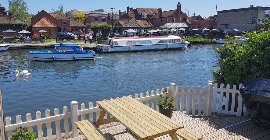 River scene from cottage terraces with constantly changing views of boats and wildlife